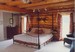 Handcrafted log homes, bedroom